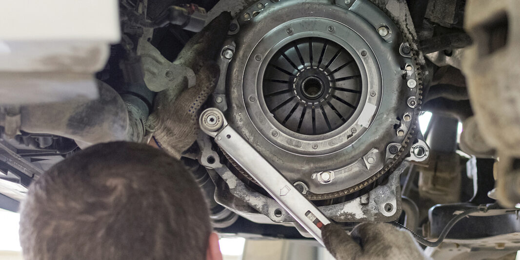 Car Repair In A Car Service. Replacing The Clutch Disc Of A Gear