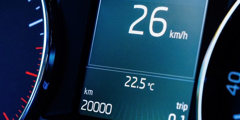 Close-up Macro Shot Of New Car Dashboard Computer Display With 2