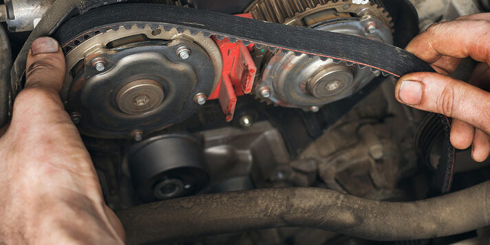 Auto Mechanic Changes The Timing Belt In The Car, Close-up