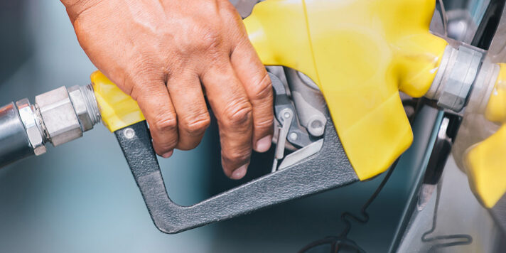 Car Refueling On The Petrol Station. Male Employees Controlled T